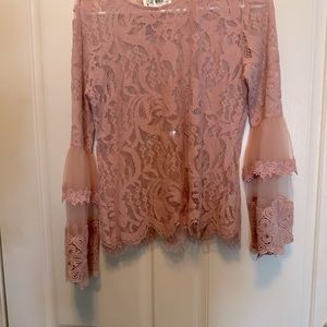 Ladies blouse pink or mauve in color sz medium